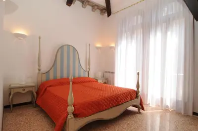 Letto o letti in una camera di Sunny Canal a/c wifi