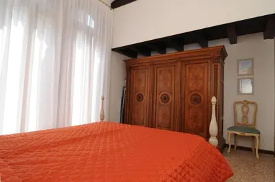 Letto o letti in una camera di Sunny Canal a/c wifi