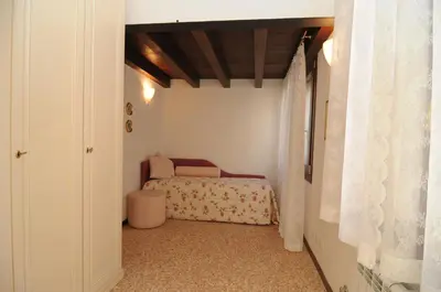 Letto o letti in una camera di Sunny Canal a/c wifi