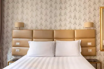 Letto o letti in una camera di Numa Venice Palazzo Orseolo