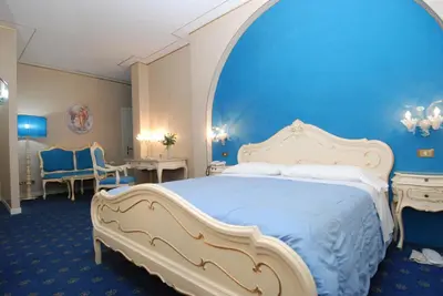 Letto o letti in una camera di Hotel Il Burchiello