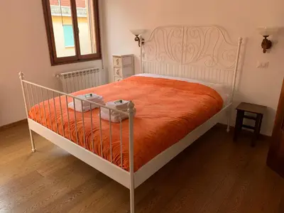Letto o letti in una camera di Casa Nini