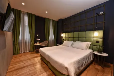 Letto o letti in una camera di Hotel Maison Ducal