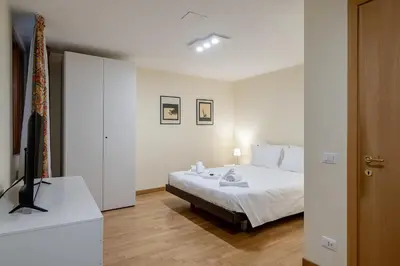 Letto o letti in una camera di Mezzanino 4438