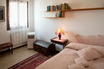 Letto o letti in una camera di Cà Lezze Bell'appartamento nel cuore di Venezia