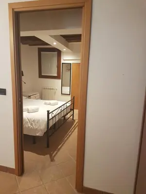 Letto o letti in una camera di Corte dei Bari