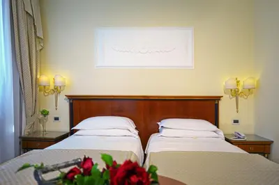 Letto o letti in una camera di Hotel Aurora Terme