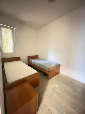 Letto o letti in una camera di RESIDENCE PANFILO - WALTERIGATO Apartments SOLO PER FAMIGLIE