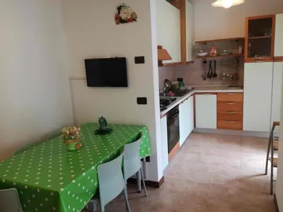 Cucina o angolo cottura di RESIDENCE IPANEMA - WALTERIGATO Apartments SOLO PER FAMIGLIE