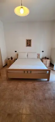 Letto o letti in una camera di RESIDENCE IPANEMA - WALTERIGATO Apartments SOLO PER FAMIGLIE