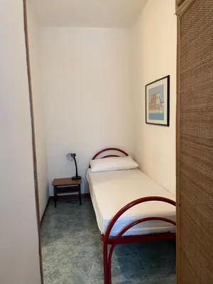 Letto o letti in una camera di CONDOMINIO CANSIGLIO- Walterigato Apartments- Solo per Famiglie