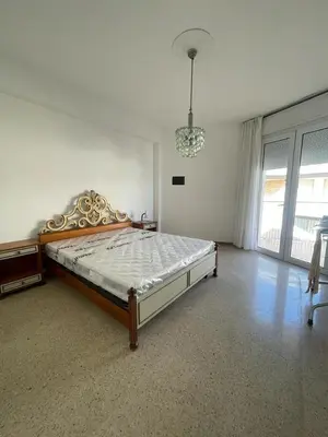 Letto o letti in una camera di RESIDENCE CENTRO COMMERCIALE - WALTERIGATO Apartments SOLO PER FAMIGLIE