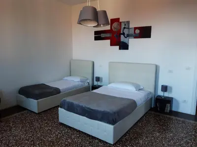 Letto o letti in una camera di Sunrise Apartment in Giudecca
