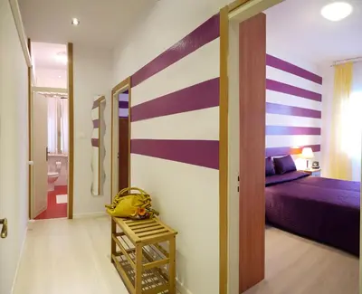 Letto o letti in una camera di Hotel Germania