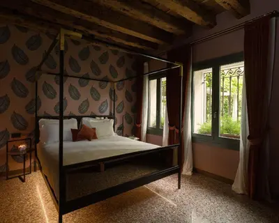Letto o letti in una camera di Madama Garden Retreat