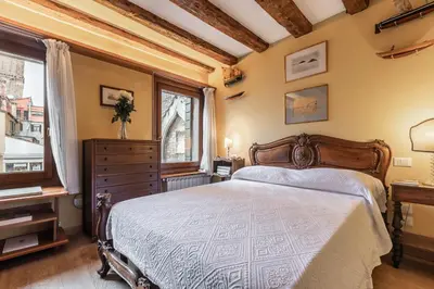 Letto o letti in una camera di La Tana Cozy Apartment in Campo San Maurizio