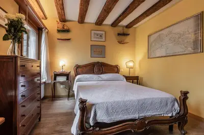 Letto o letti in una camera di La Tana Cozy Apartment in Campo San Maurizio