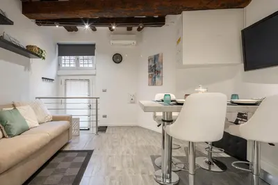 TV o dispositivi per l'intrattenimento presso Rialto Boutique Apartment