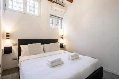Letto o letti in una camera di Rialto Boutique Apartment