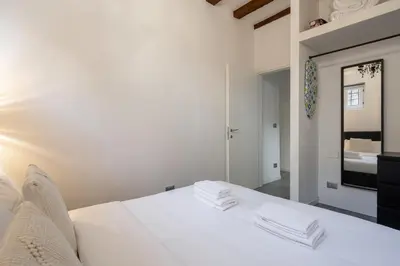 Letto o letti in una camera di Rialto Boutique Apartment