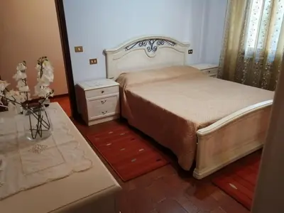 Letto o letti in una camera di LA CARLOTTINA
