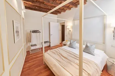 Letto o letti in una camera di AppartamentoPalladio140