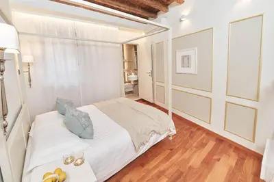 Letto o letti in una camera di AppartamentoPalladio140