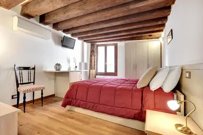 Letto o letti in una camera di Residenza Valier - Rialto by Wonderful Italy