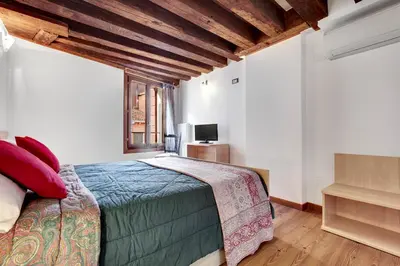 Letto o letti in una camera di Residenza Valier - Rialto by Wonderful Italy