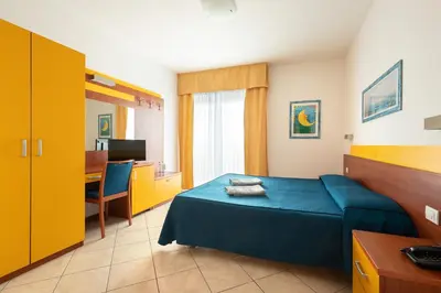 Letto o letti in una camera di Hotel Sheila
