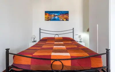 Letto o letti in una camera di Piccolo flat near Venice