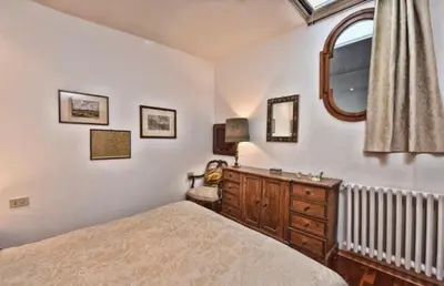 Letto o letti in una camera di San Marco Garden House
