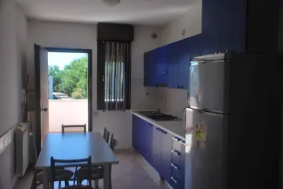 Cucina o angolo cottura di Apartments in Rosolina Mare 33097