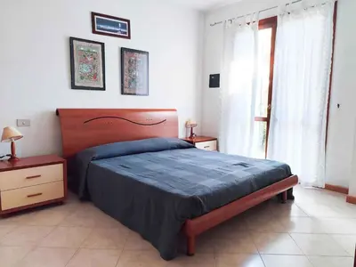 Letto o letti in una camera di Apartments in Cavallino-Treporti 27935