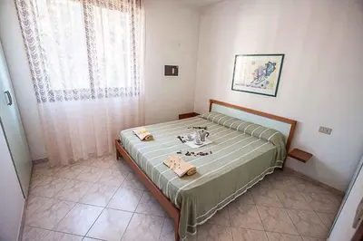 Letto o letti in una camera di Apartment in Rosolina Mare 25085