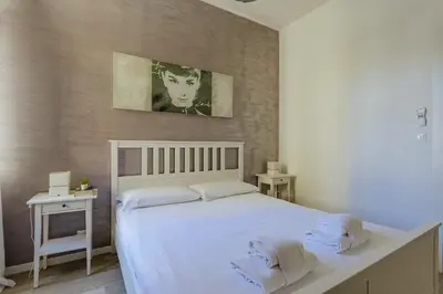 Letto o letti in una camera di Yourbanflat Clock Tower
