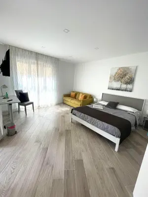 Letto o letti in una camera di Padua Suite
