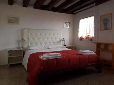 Letto o letti in una camera di Cà Del Giazzo