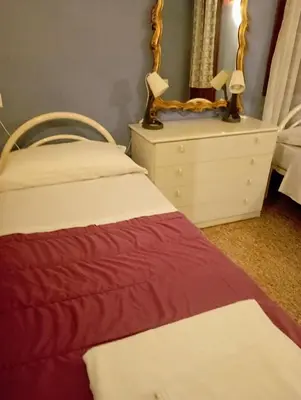 Letto o letti in una camera di Exclusive Ca Quadri Apartments