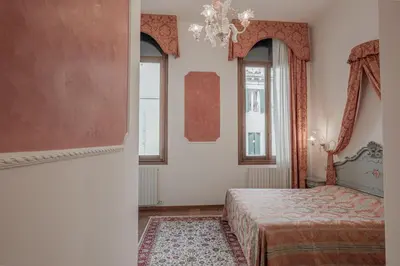 Letto o letti in una camera di Hotel al Sotoportego