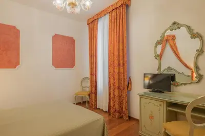 Letto o letti in una camera di Hotel al Sotoportego