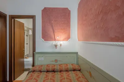 Letto o letti in una camera di Hotel al Sotoportego