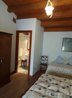 Letto o letti in una camera di agriturismo la scuderia