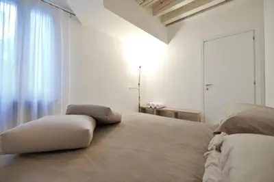 Letto o letti in una camera di Venetian Apartments
