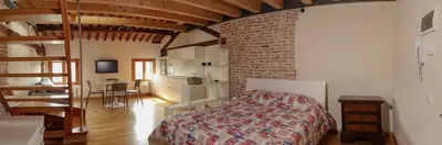 Letto o letti in una camera di Loft Mirano Due (Alloggi alla Campana)