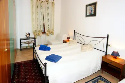 Letto o letti in una camera di CASA VACANZA LYUDMYLA