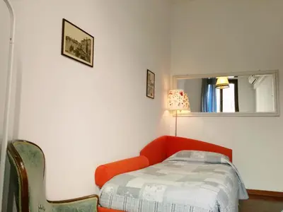 Letto o letti in una camera di Ponte San Lorenzo apartment