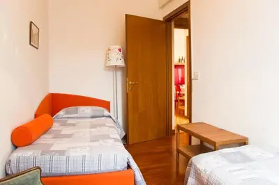 Letto o letti in una camera di Ponte San Lorenzo apartment