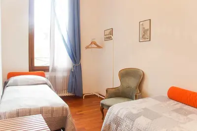 Letto o letti in una camera di Ponte San Lorenzo apartment