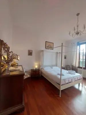 Letto o letti in una camera di Ponte San Lorenzo apartment